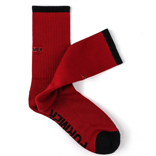 A pair of Former Legacy Socks in red