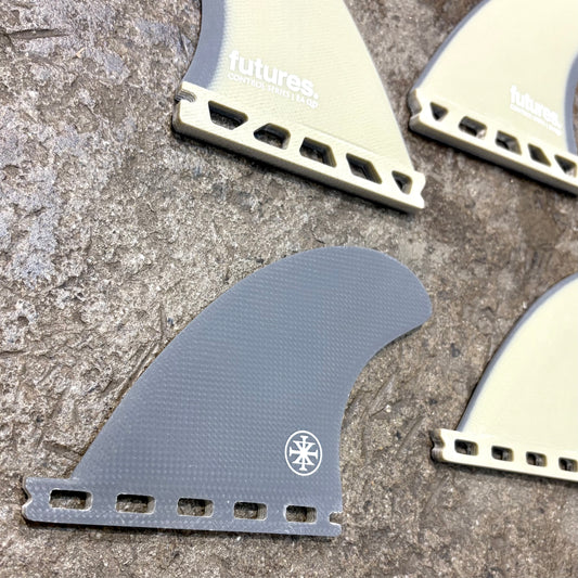 A set of Futures EA Control Series Quad on a concrete floor, showing the grey inside of the rear fin