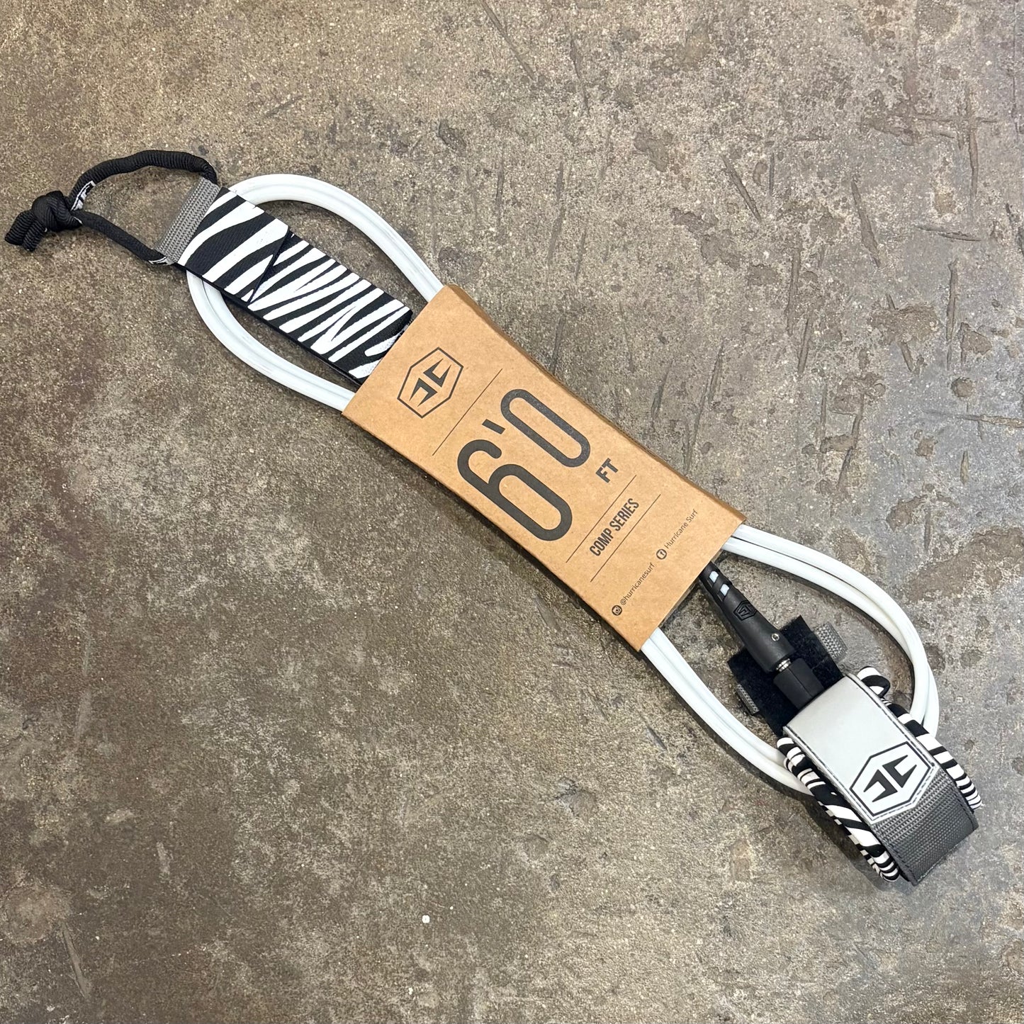 Leash with a Hurricane label on a concrete surface