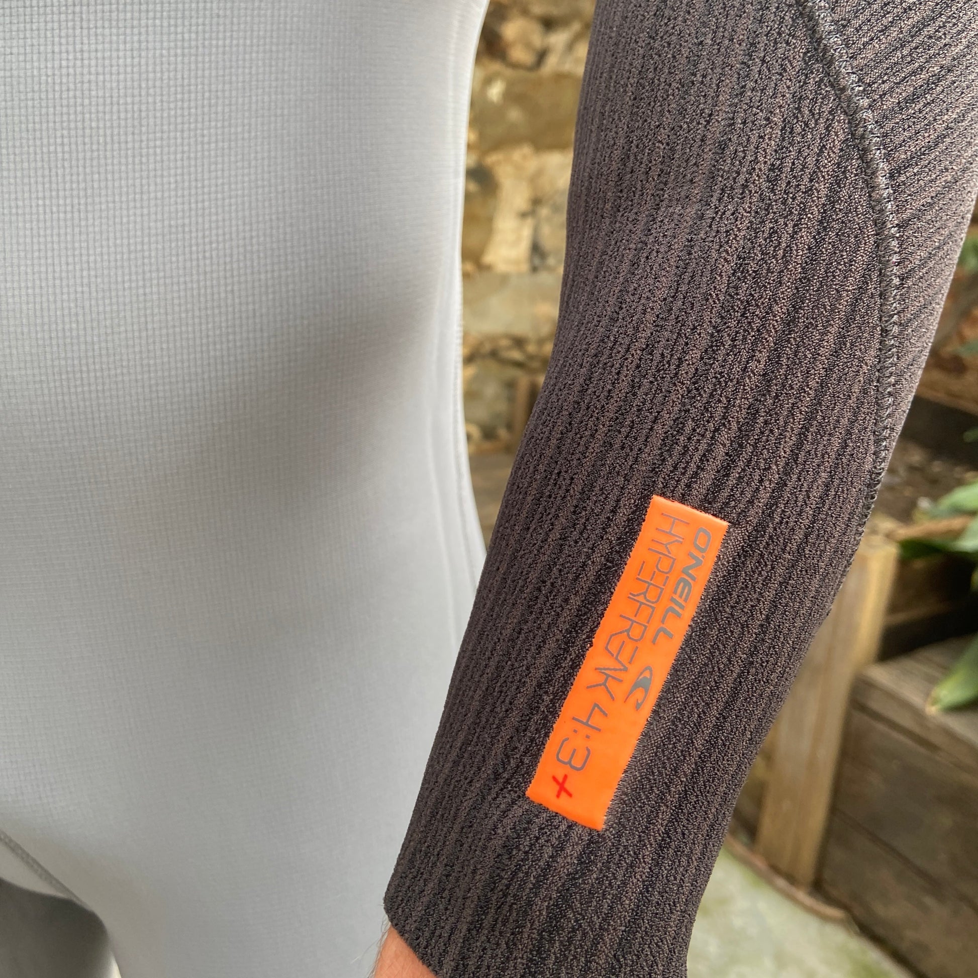 Detailed view of the sleeve on the O'Neill Hyperfreak 3/2mm+ Chest Zip - Smoke Raven - Men's Fullsuit