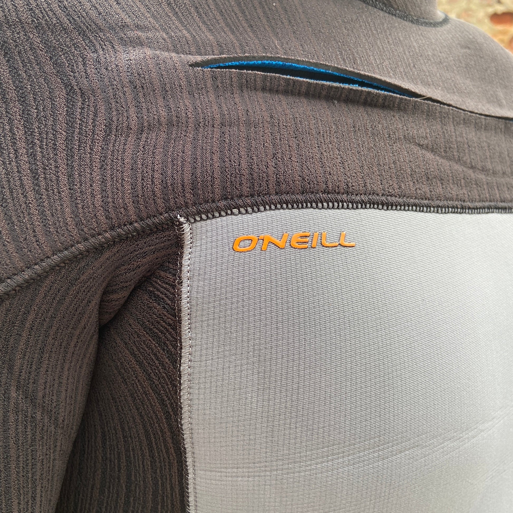Detailed view of the zip closure on the O'Neill Hyperfreak 3/2mm+ Chest Zip - Smoke Raven - Men's Wetsuit