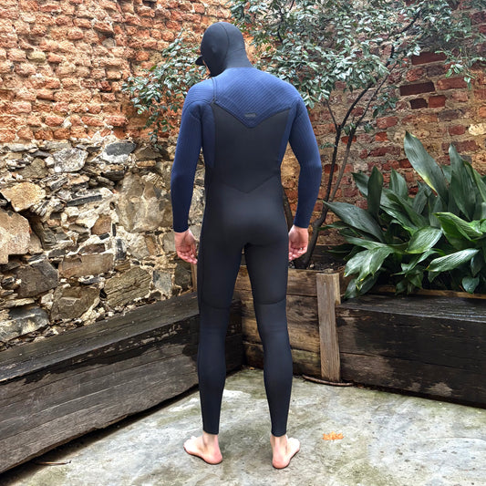 Back view of O'Neill Hyperfreak 4/3+ Chest Zip Hooded worn by model- Black and Navy Mens Wetsuit