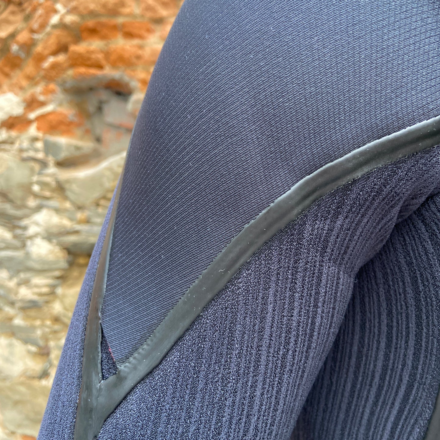 Detailed view of the drainage hole on the O'Neill Hyperfreak Fire 3/2mm+ Chest Zip - Black- Full Wetsuit