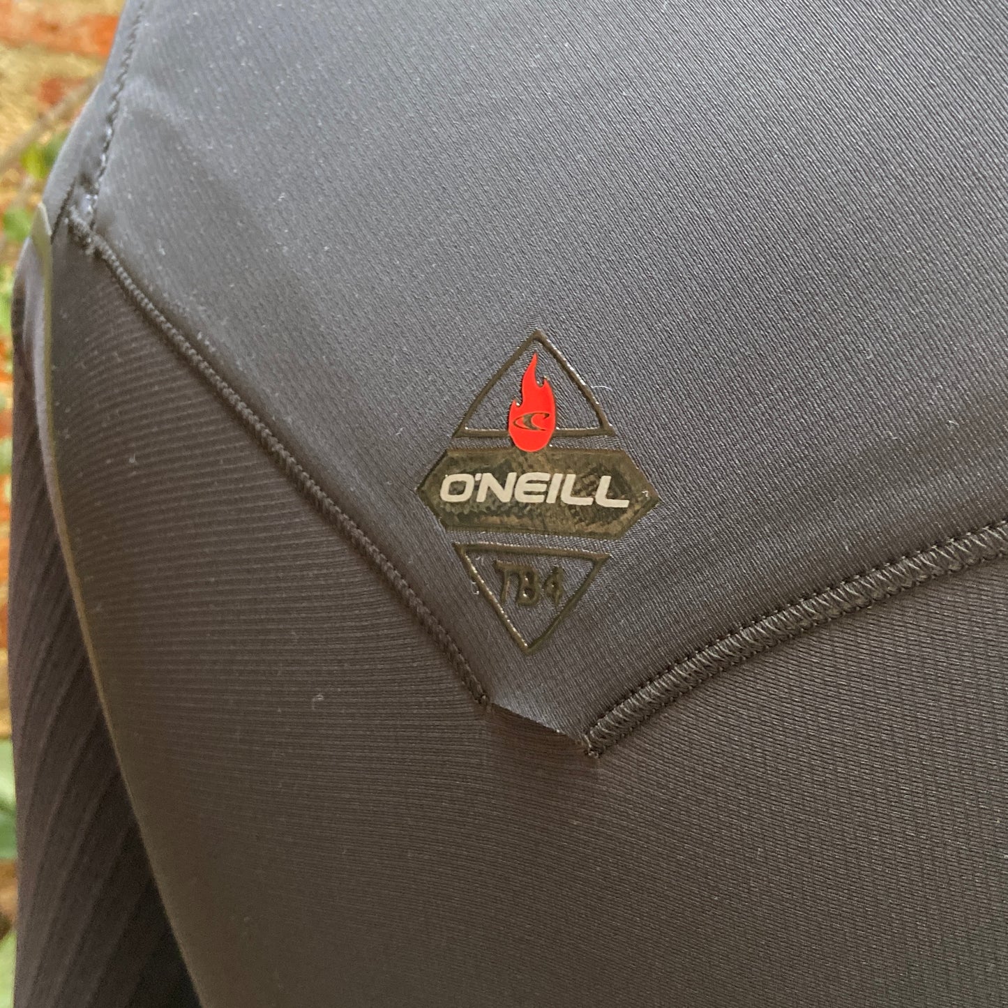 Back Drainage hole view on the O'Neill Hyperfreak Fire 3/2mm+ Chest Zip - Black- Full Wetsuit