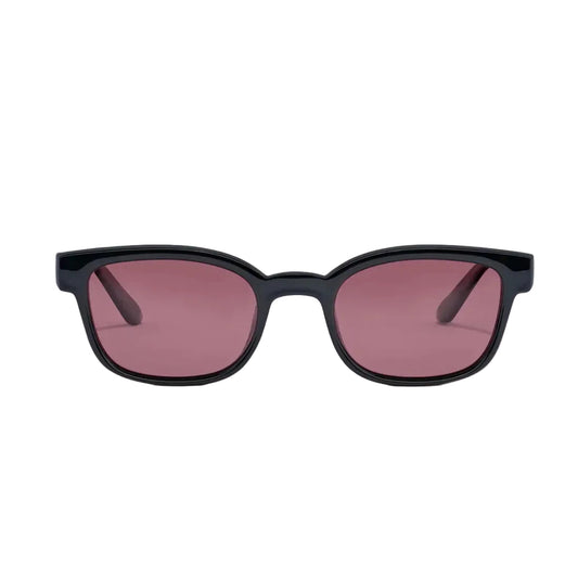Black sunglasses with pink lenses on a white background