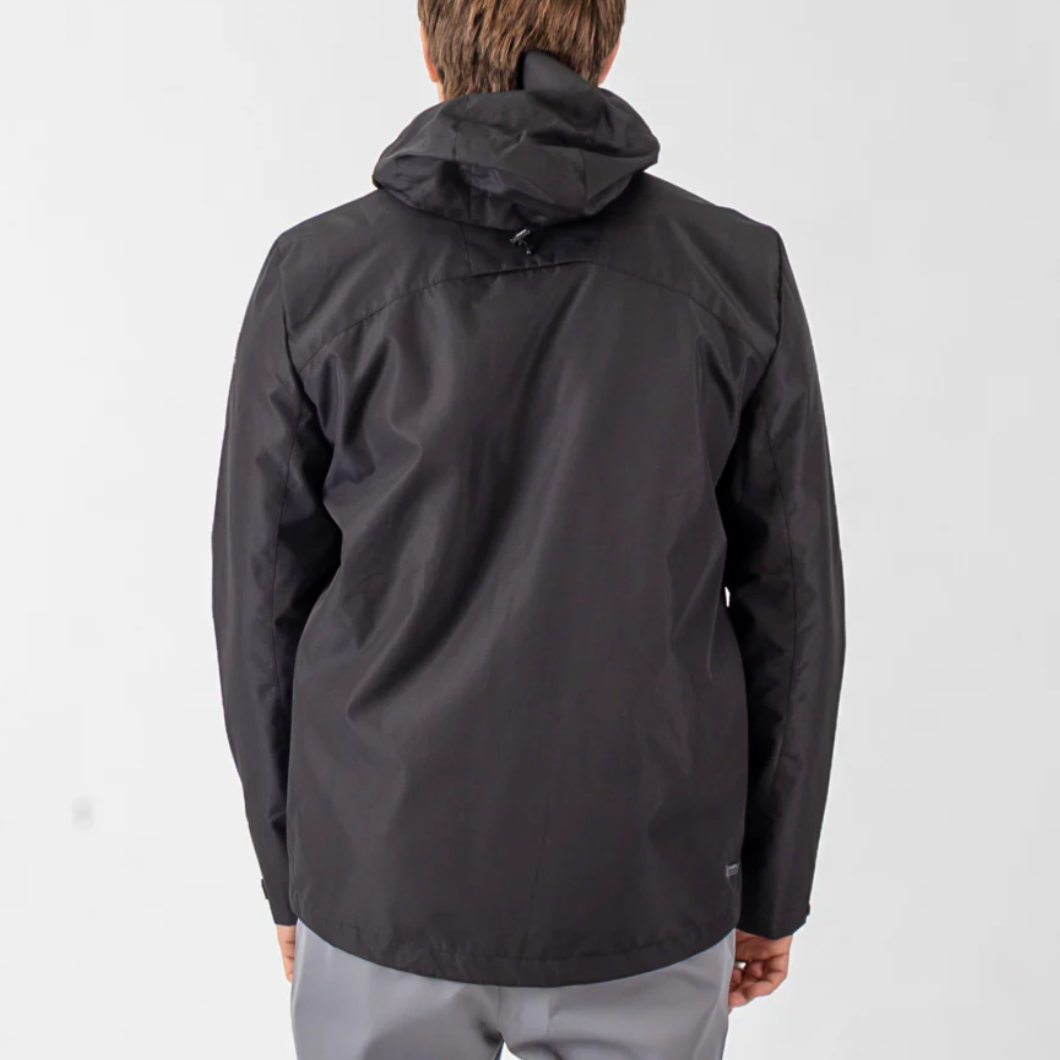 Person wearing a black jacket on a white background
