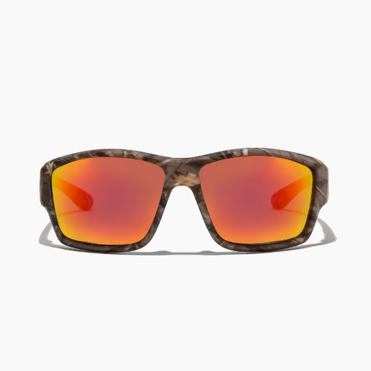 Sunglasses with camouflage frame and orange-red lenses on a white background