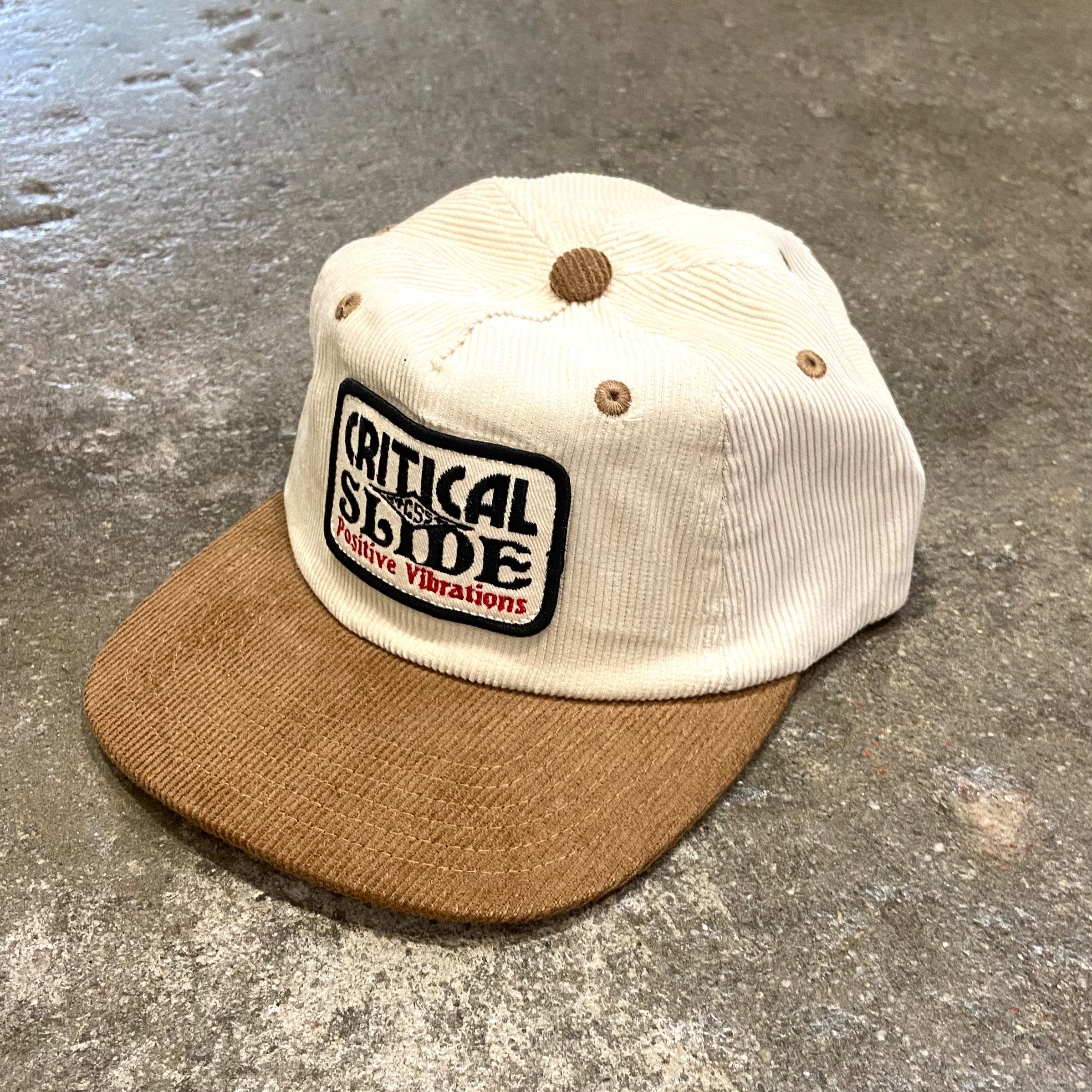 THE CRITICAL SLIDE SOCIETY Introducing the Vibrations Patch Cap crafted from 12 wale cotton Corduroy. This hat features a front panel embroidered patch combining classic style with modern comfort for ...
