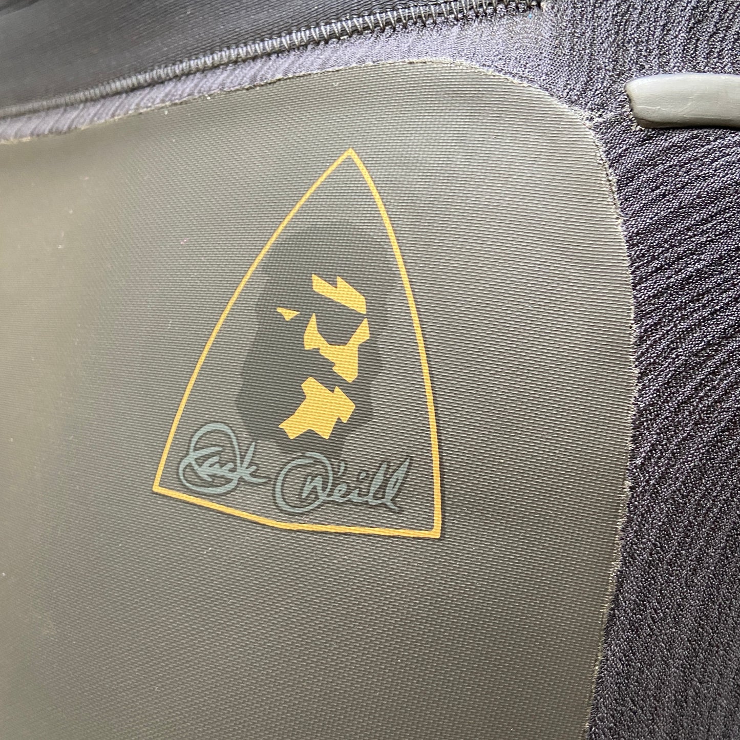 View of the detail on the rubber chest on the O'Neill Mutant Legend 4.5mm/3.5mm - Black - Hooded Wetsuit