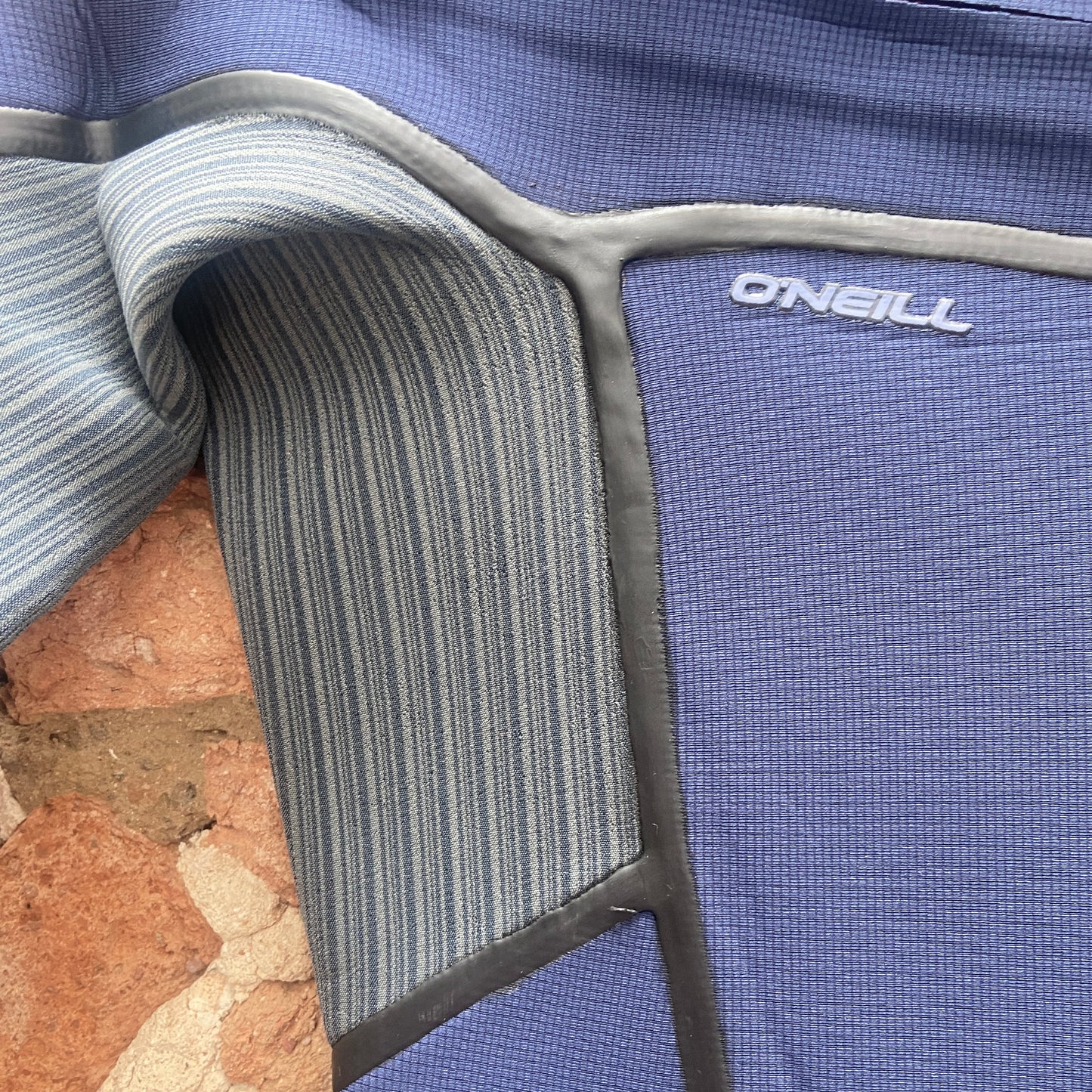 Detailed view of liquid weld seams on the O'Neill Woman's Hyperfreak Fire 4/3mm+Chest Zip