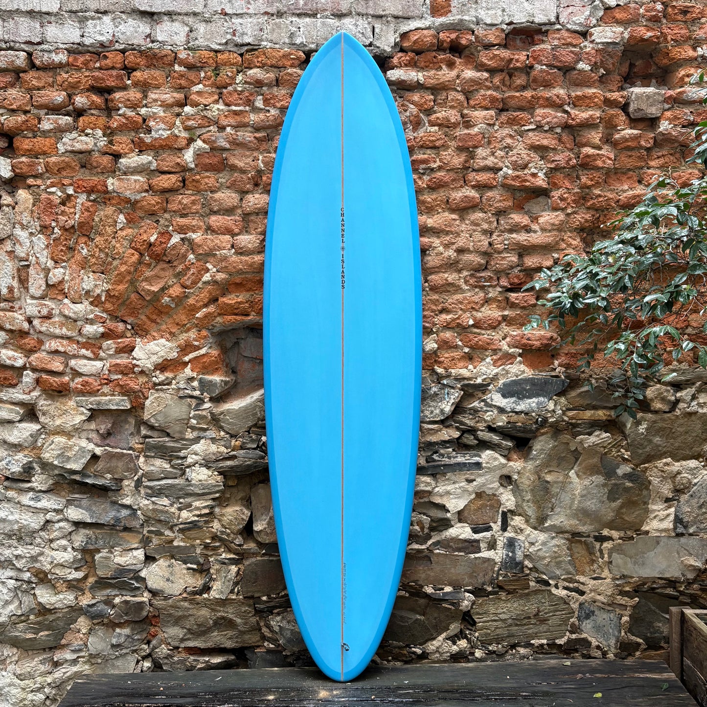 FRONT VIEW OF A CHANNEL ISLANDS   MID   7'0  21 1/8  2 3/4  44.9L SURFBOARD