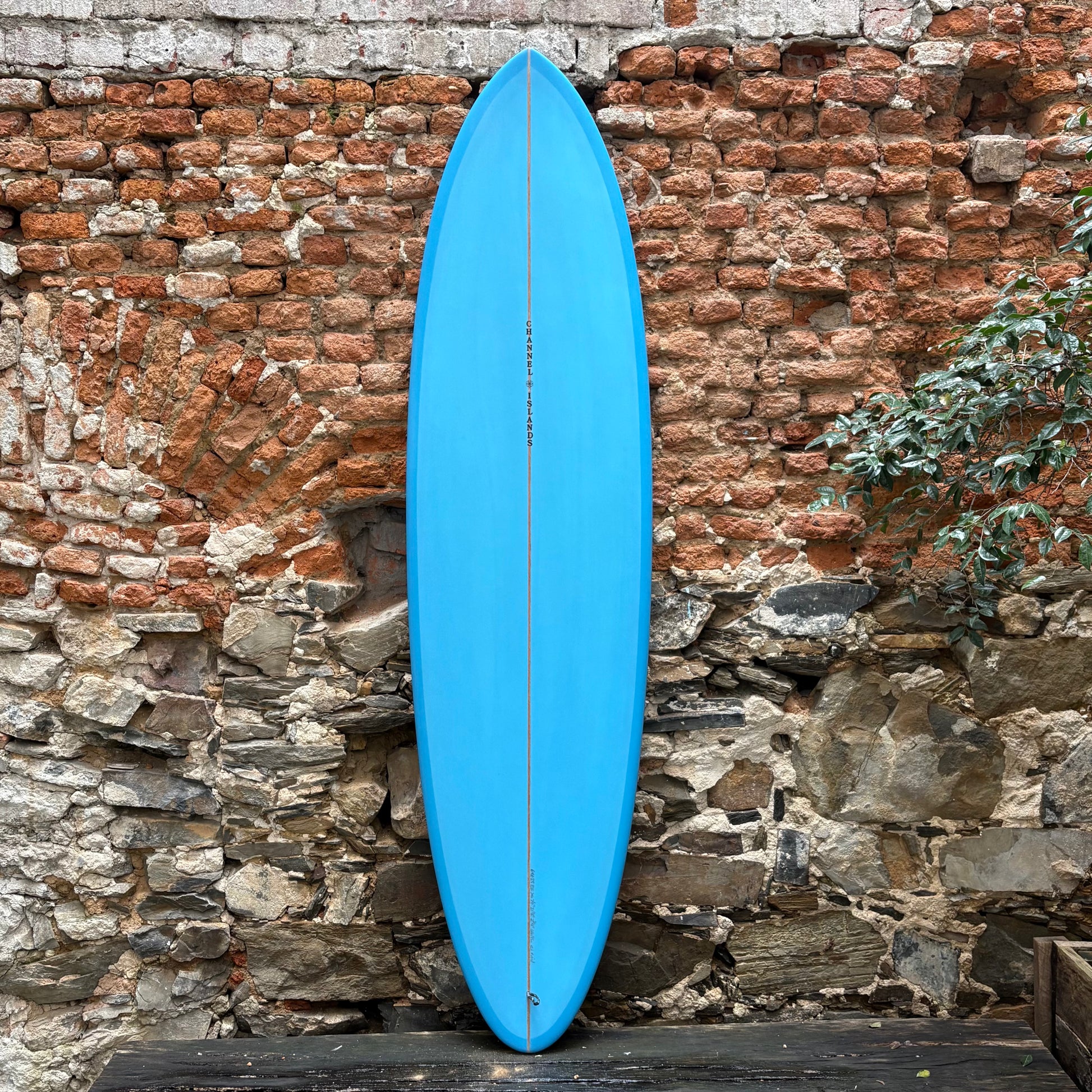 FRONT VIEW OF A CHANNEL ISLANDS   MID   7'0  21 1/8  2 3/4  44.9L SURFBOARD