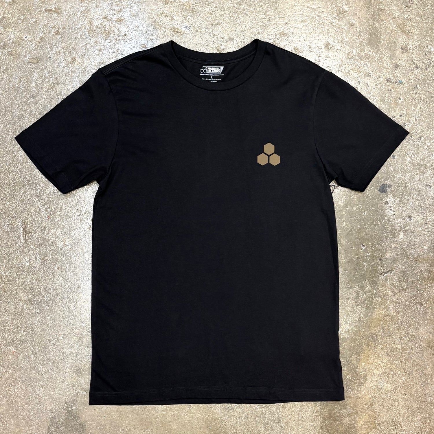 Black Channel Islands T-Shirt on concrete floor