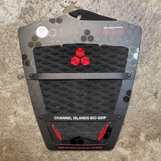 A black and white surfboard traction pad with a geometric pattern and the Channel Islands logo.