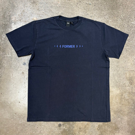 Black t-shirt with blue text on a concrete surface