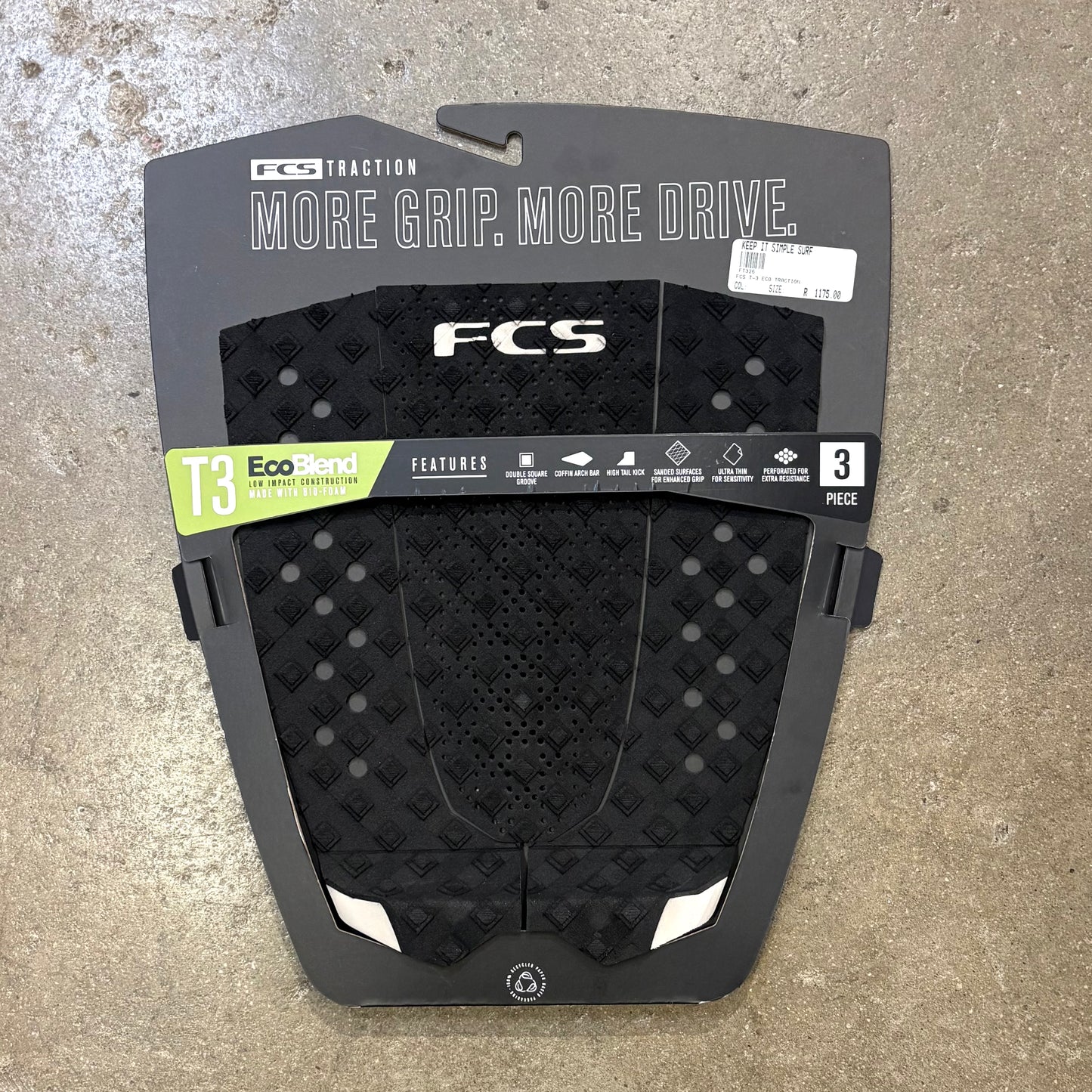 Black FCS traction pad on a textured surface