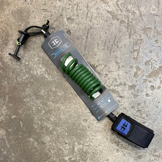 Green HURRICANE   BODYBOARDING COILED WRIST LEASH 8MM in Packaging on concrete floor