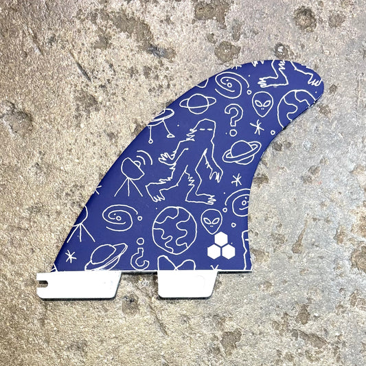 Blue and white patterned object on a textured surface