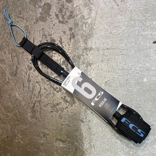 FCS Regular Surf Leash 6ft 7mm on concrete floor