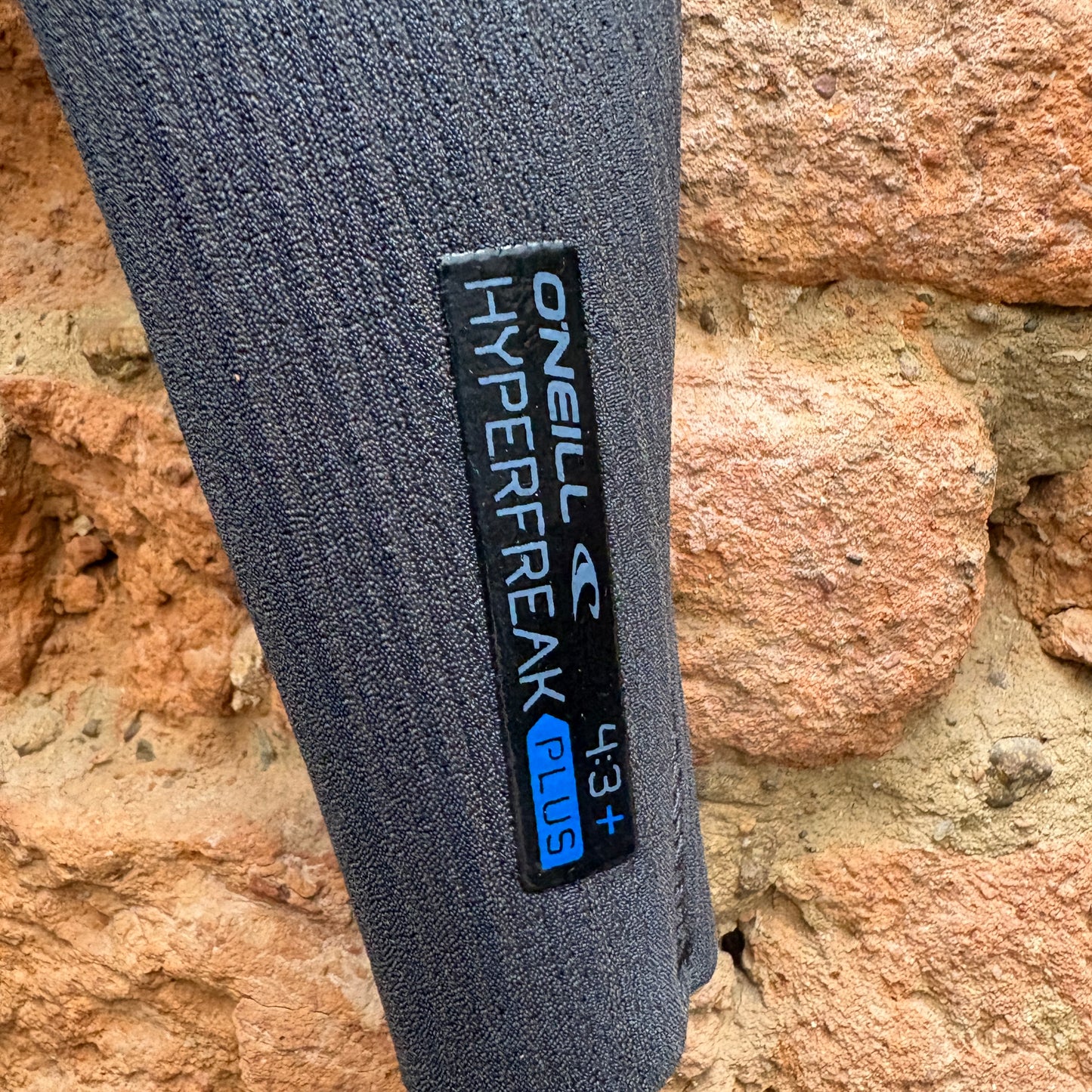 Close up picture of O'Neill wetsuit logo