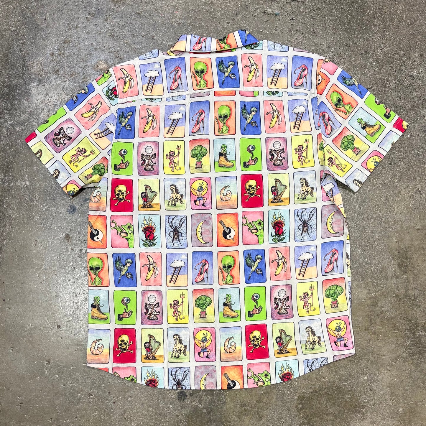 Colorful t-shirt with a unique pattern on a concrete surface