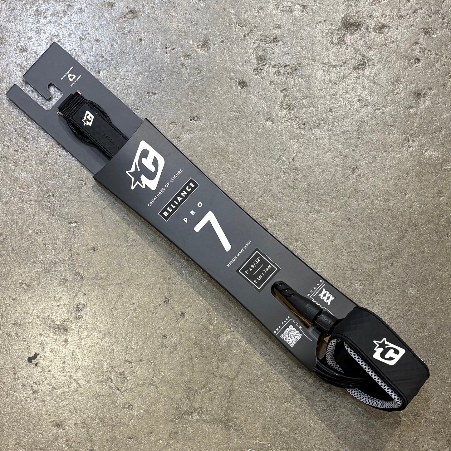 Reliance Pro 7 ski binding packaging on a concrete surface
