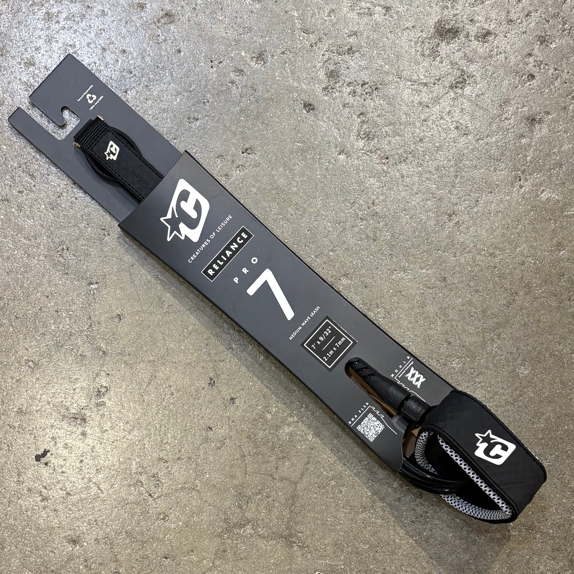 Reliance Pro 7 ski binding packaging on a concrete surface