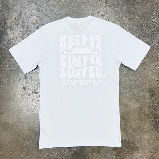 A sky blue short-sleeve t-shirt with a large, tonal white graphic print on the front reading 'KEEP IT SIMPLE SURF CO.'
