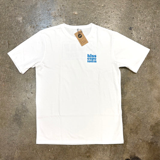 White t-shirt with  Kiss Cape Town Logo on a textured gray surface