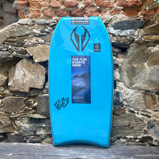 Blue bodyboard with branding against a stone wall