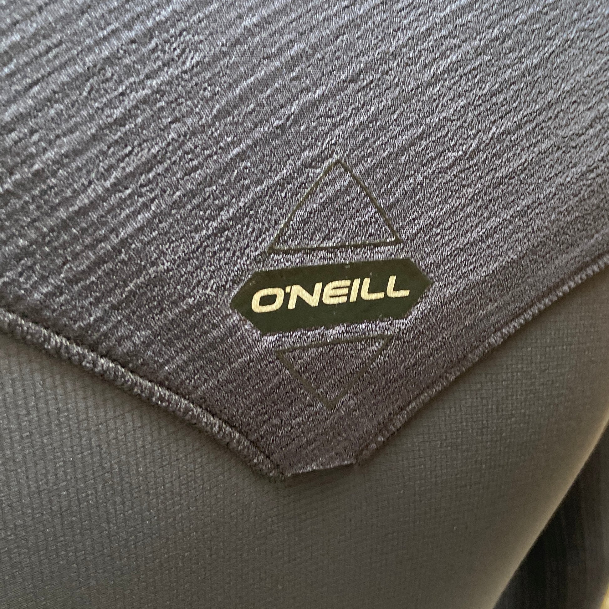 View of the back drainage hole on the O'Neill Hyperfreak 4/3mm+ Chest Zip - Black - Men's Full Wetsuit
