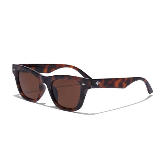 Sunglasses with tortoiseshell frame and brown lenses on a white background