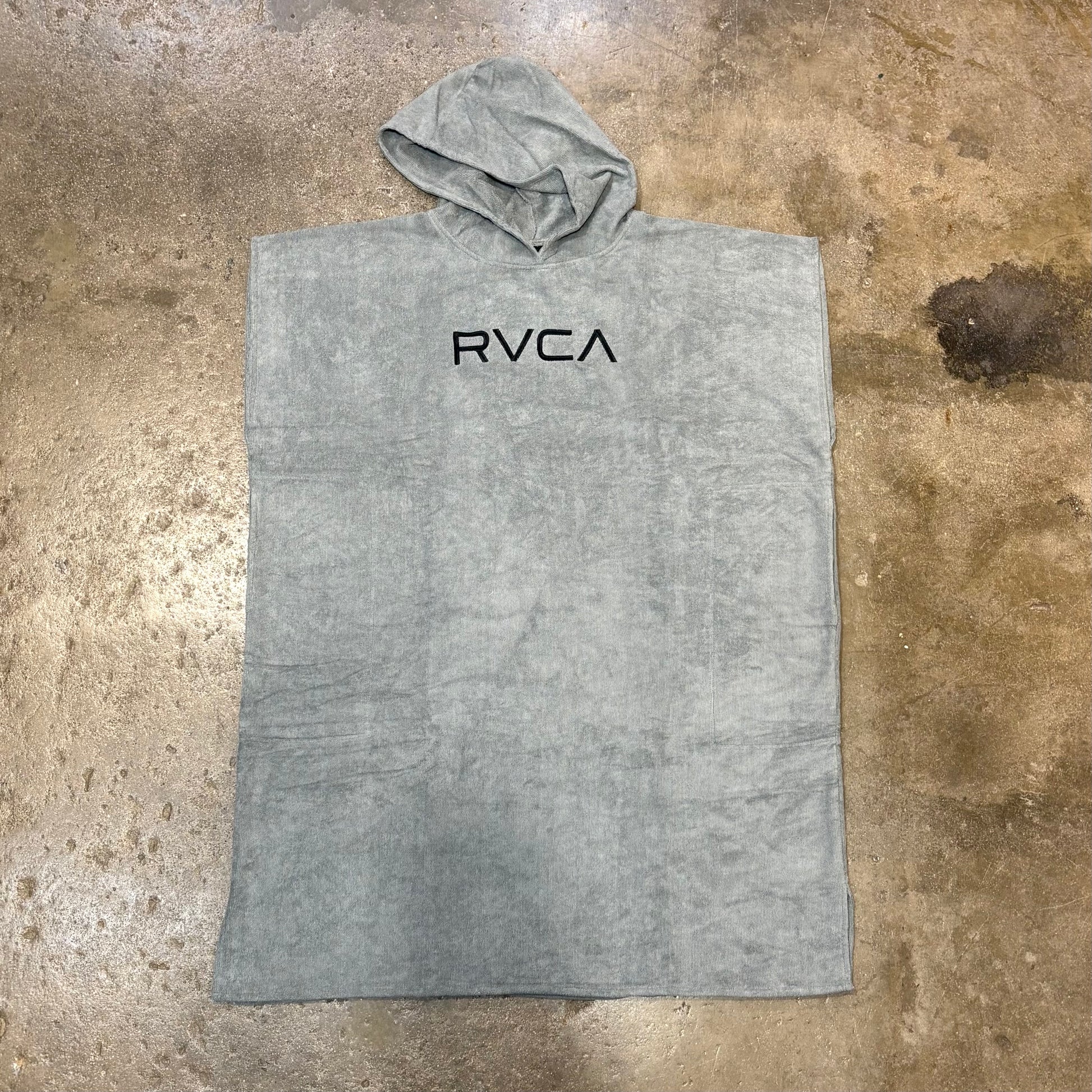 Gray hoodie with 'RVCA' logo on a textured surface