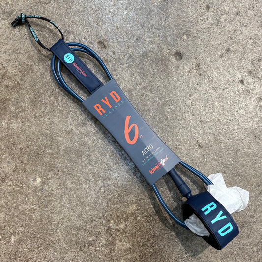 Blue and gray RYD surfboard leash on a concrete surface