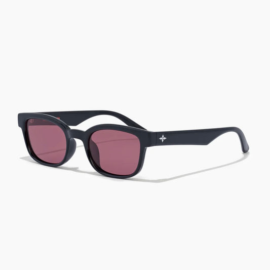 Black sunglasses with purple lenses on a white background