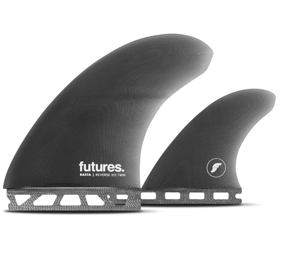 Two black surf fins with 'futures' branding on a white background