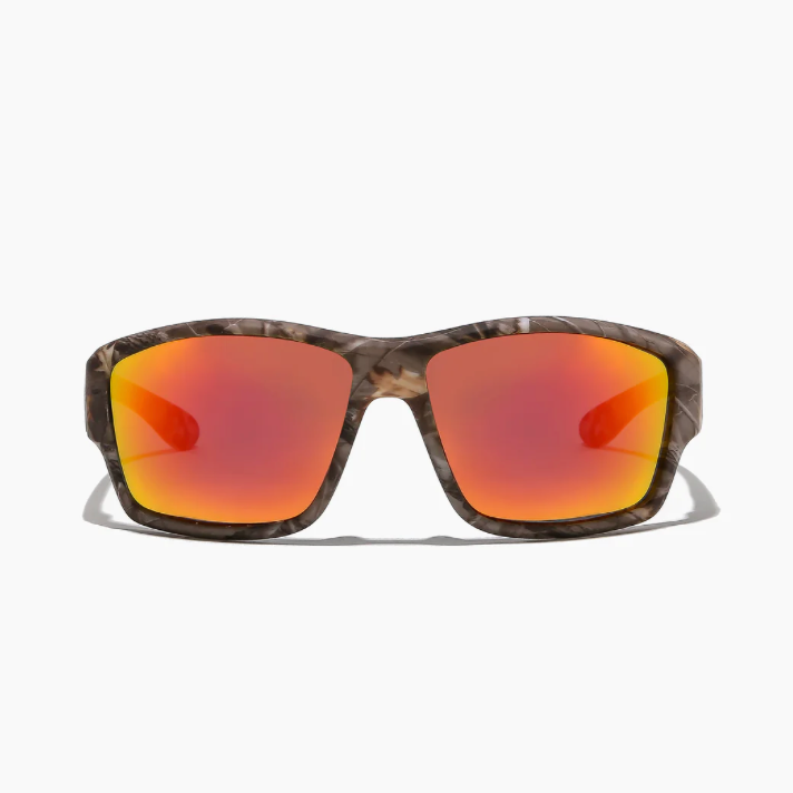 Sunglasses with camouflage frame and orange-red lenses on a white background