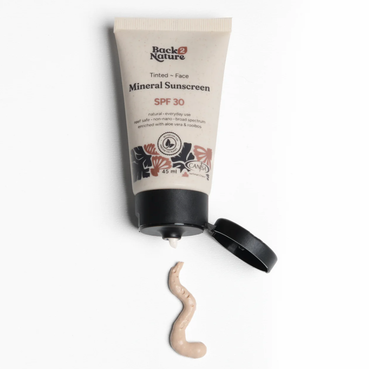 A squeeze tube of Back to Nature Tinted Face Mineral Sunscreen SPF 30 with its cap off, shown on a white background with a dollop of the beige tinted sunscreen cream below it.
