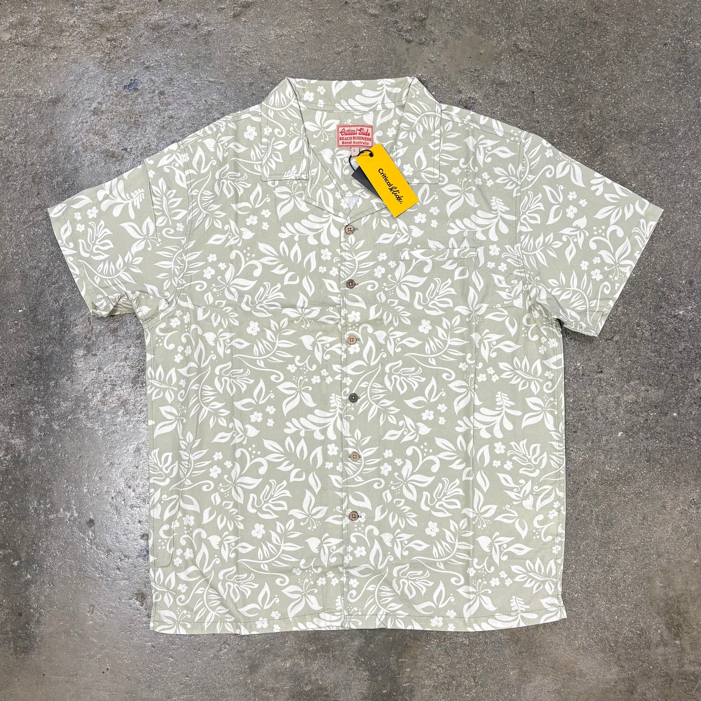 Short-sleeve shirt with a subtle pattern on a textured surface