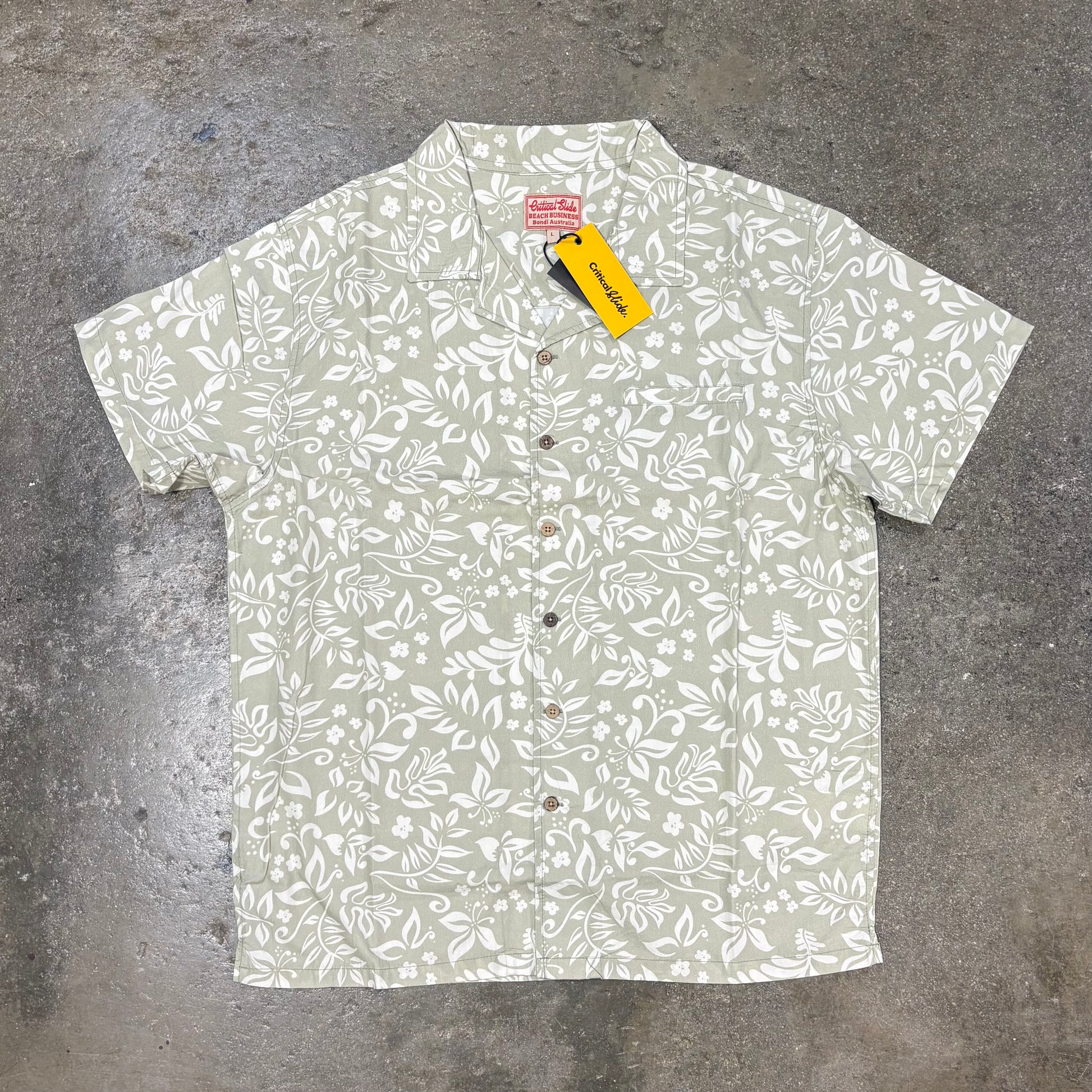 Short-sleeve shirt with a subtle pattern on a textured surface