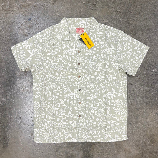 Short-sleeve shirt with a subtle pattern on a textured surface