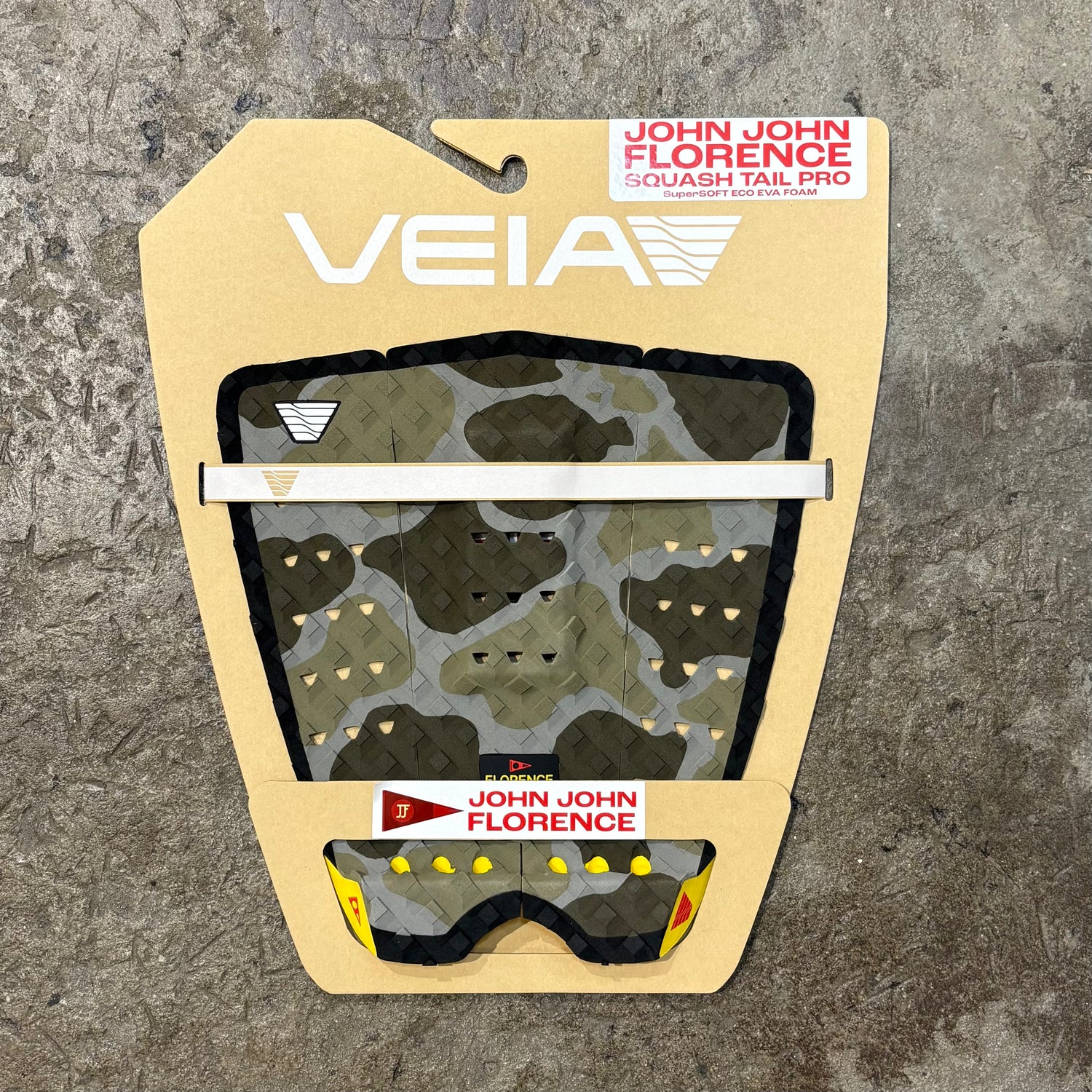 Veia squash tail pro packaging with John John Florence branding on a textured surface