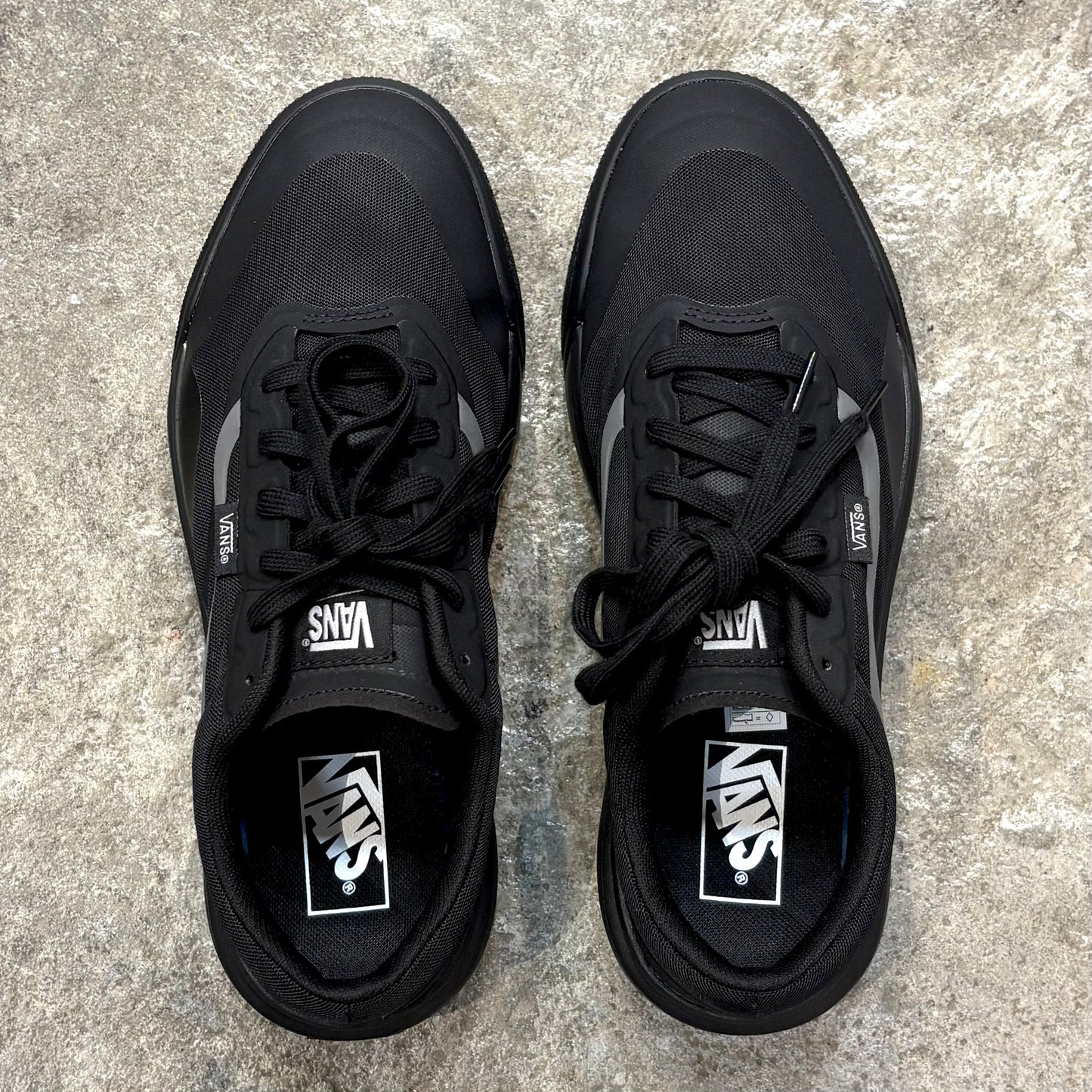 Pair of VANS  MTE ULTRARANGE 2.0 on concrete floor