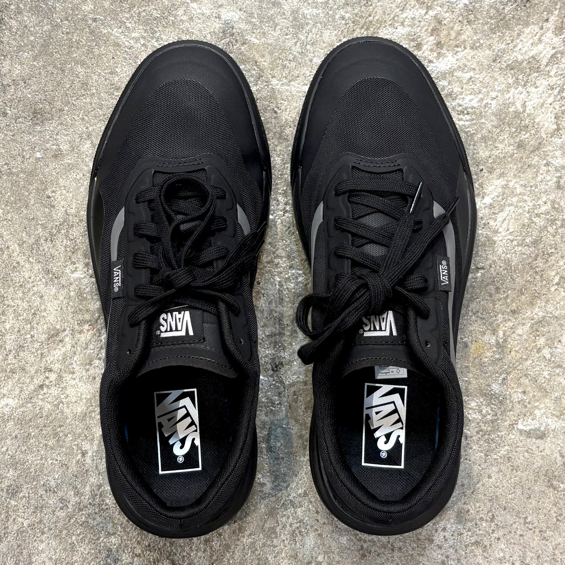 Pair of VANS  MTE ULTRARANGE 2.0 on concrete floor