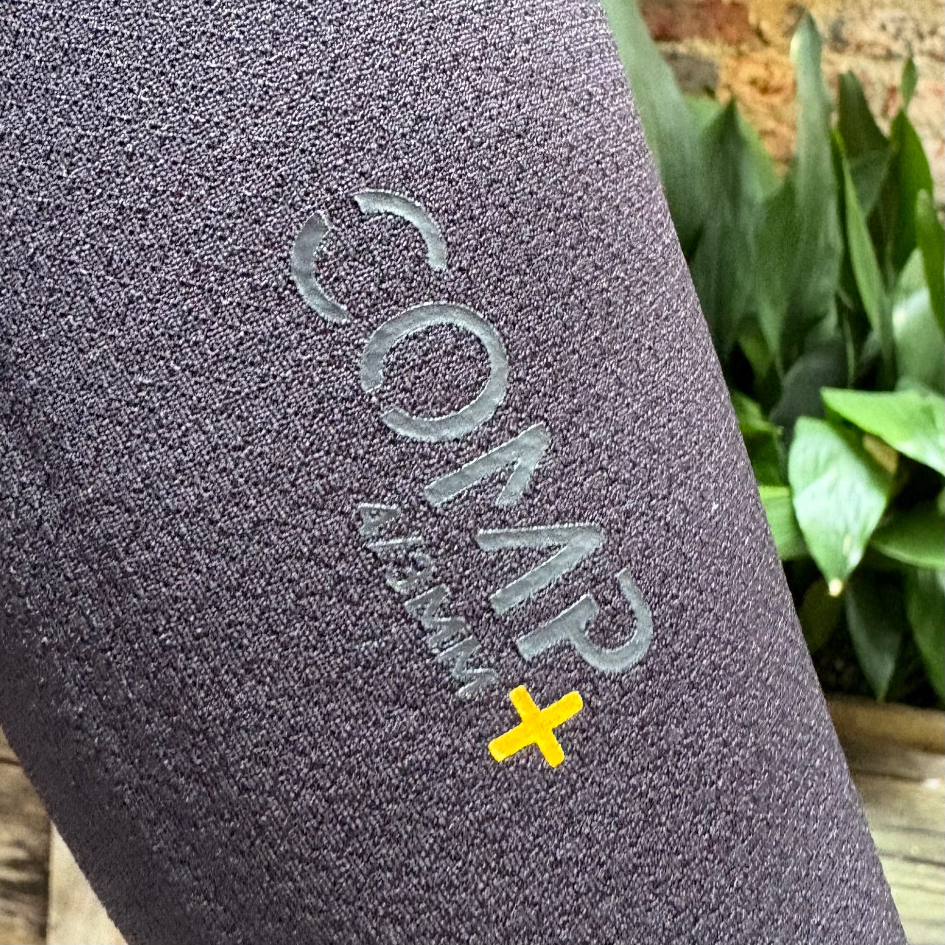 View of details on the sleeve of the Xcel Comp+ 4/3mm - Black - Men's Full Suit
