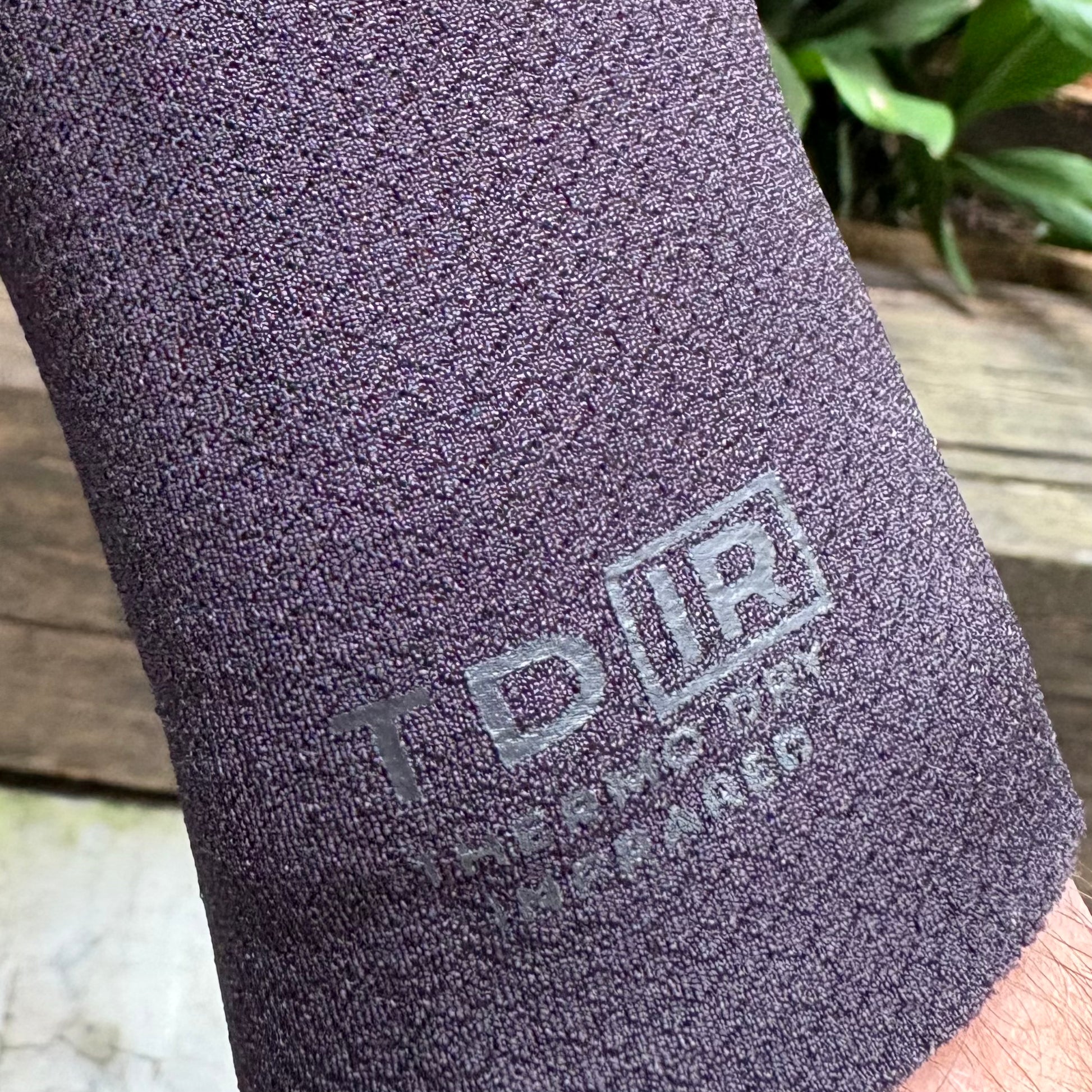 View of the detail on the wrist cuff of the Xcel Comp+ 4/3mm - Black - Men's Full Suit