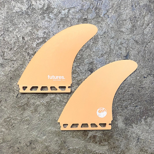 futures ZACK FLORES TWIN Fins on a concrete floor