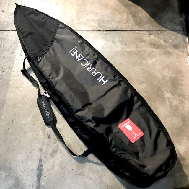 Black Hurricane Super Traveller Surfboard Cover with red fragile logo